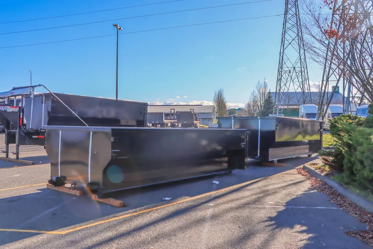 Roll-off dumpster ready for waste disposal at job site for 2 Yard Dumpster Rental in Pocatello